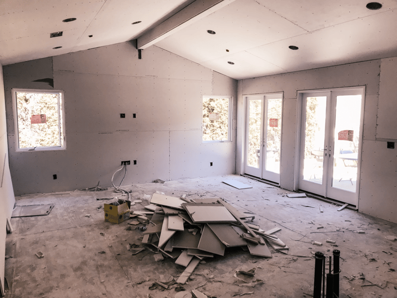 Stunning modern remodel uses black window and patio door frames preview 4