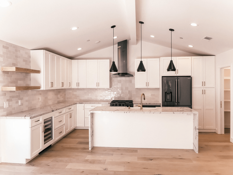 Stunning modern remodel uses black window and patio door frames preview 7