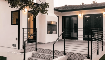 Stunning modern remodel uses black window and patio door frames